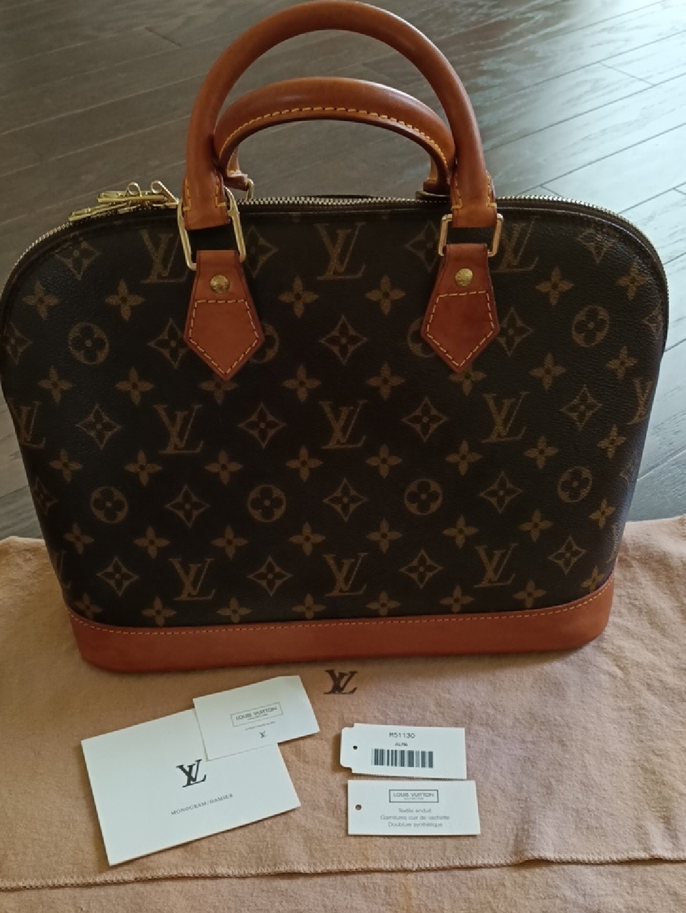 Louis Vuitton Brown Monogram Alma PM Handbag with Tan Leather